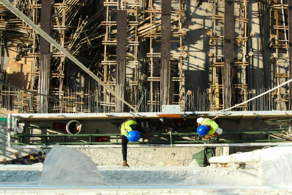 men wearing blue safety hard hat